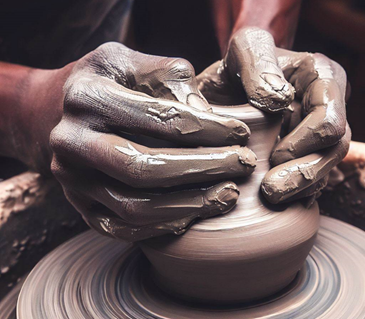 Clay is shaped on a potter’s wheel.